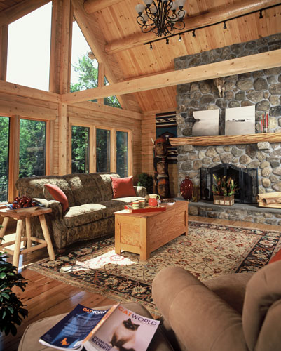 Great room with large fireplace and purlins